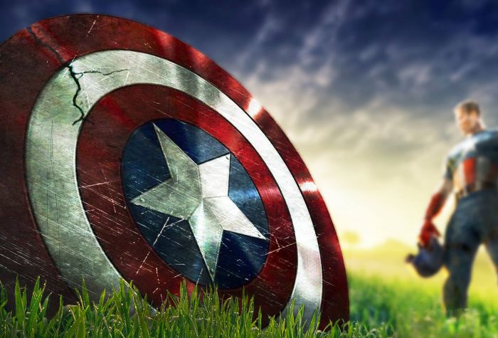 Картинка щит в траве возле Капитана Америки